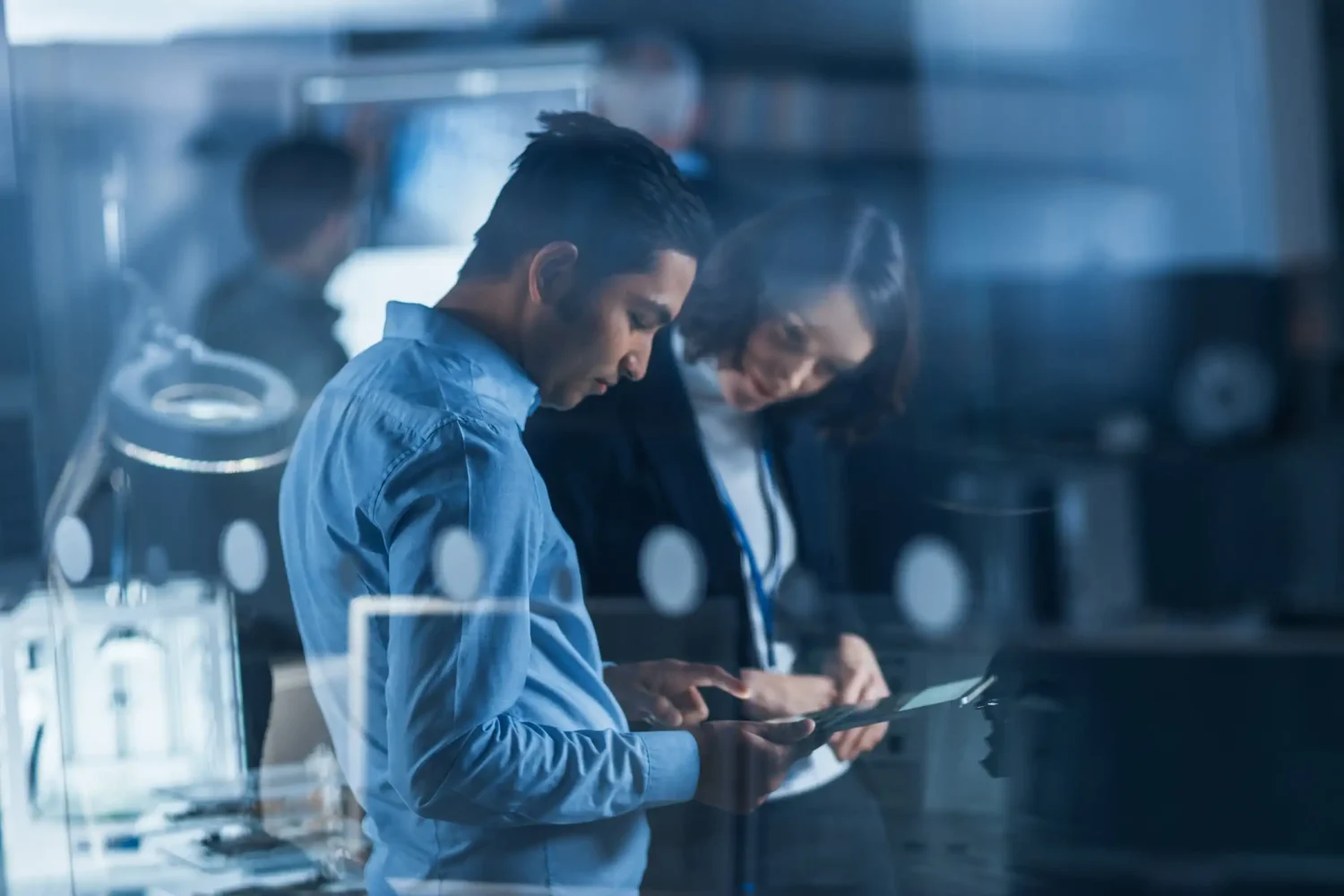 two_people_review_information_on_a_tablet_in_an_office_workspace_collaboration_communication_planning_strategy_tactics_teamwork_by_gorodenkoff_shutterstock_1682600950_2400x1600-100890810-orig-2