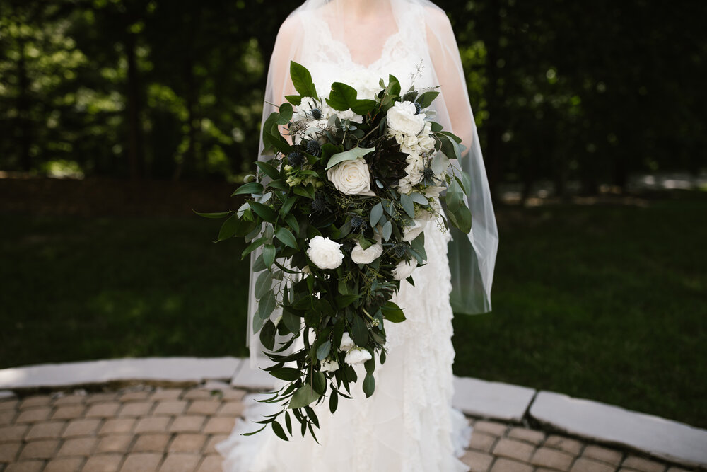 cascading+greenery+wedding+bouquet+with+white+roses