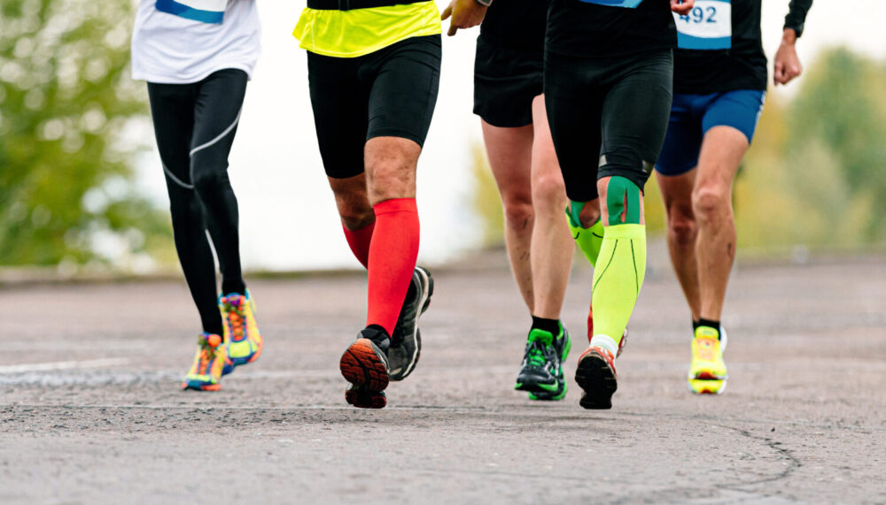 legs male runners in compression socks