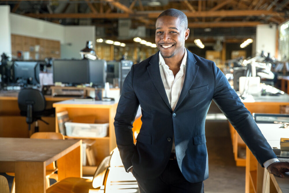 African american entrepreneur business owner ceo portrait at the creative design office